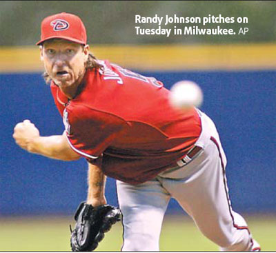 Johnson's strikeout landmark unable to prevent loss