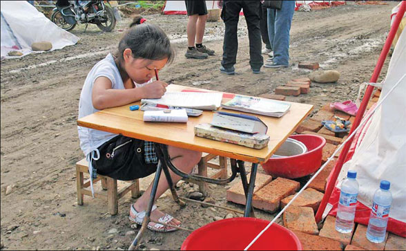 Survivors cope with rain, heat