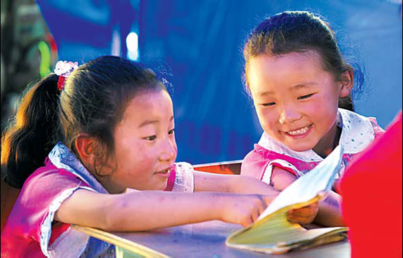 Pupils keep widower busy