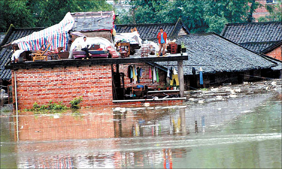 57 killed as rain, floods lash south