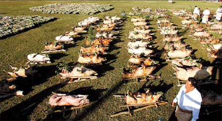 Roasted pigs, flowers greet new Tonga king