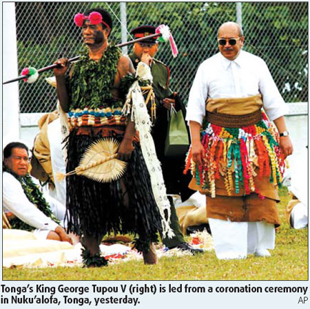 Roasted pigs, flowers greet new Tonga king