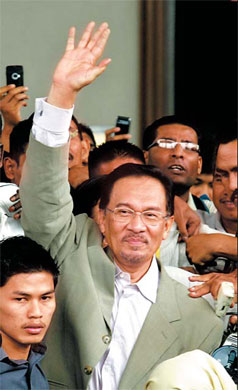 Anwar charged with sodomy, granted bail