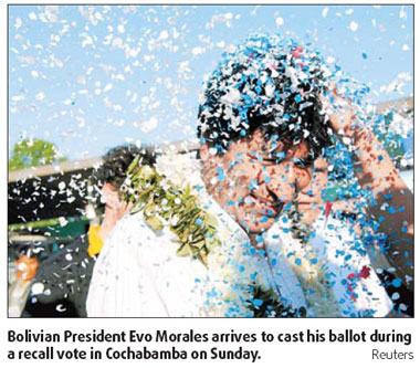 Morales easily wins recall vote