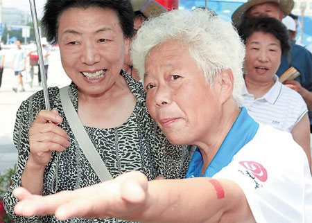 Elderly volunteer full of passion
