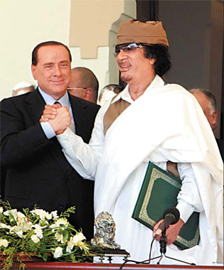 Khadafy, Berlusconi ink $5 billion accord