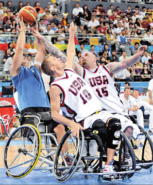 Paralympians set Water Cube on fire