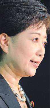 Koike takes on malerivals intop job race