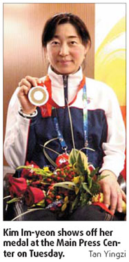 Shooter aiming for more than gold