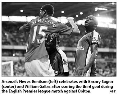 Gunners go top as Liverpool's title hopes compromised