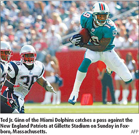 Dolphins end Patriots' winning streak