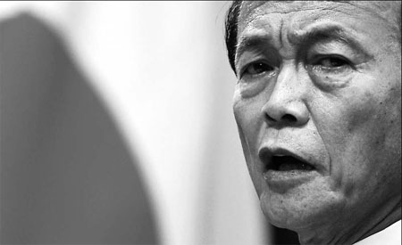 Aso picks chums, hawkish Cabinet