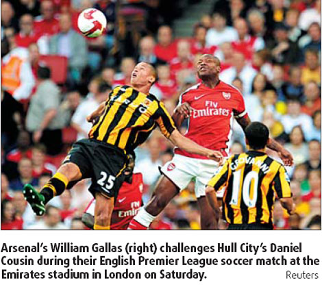 Chelsea back on top, Gunners ambushed