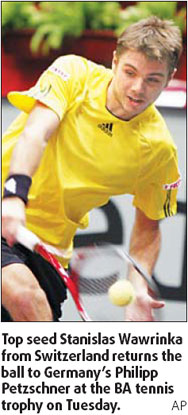 Wawrinka ousted in opener