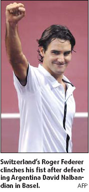Federer completes hometown hat-trick
