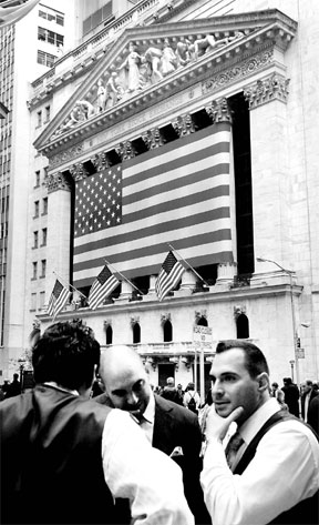 Wall Street execs face bonus cut
