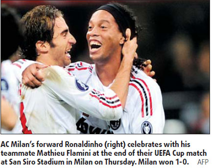 Milan strike late, Sevilla suffer UEFA Cup loss