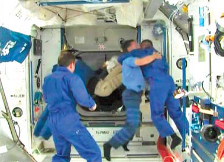 Spacemen unpack new toilet