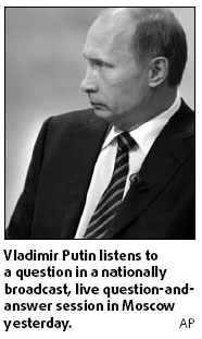 Putin confident of bracing crisis
