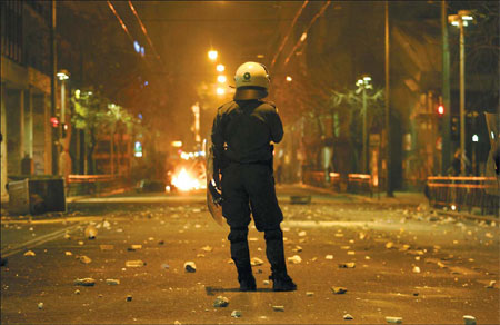Greek cities rocked by riots after boy's shooting