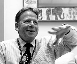 Guitar-toting director in tune with students
