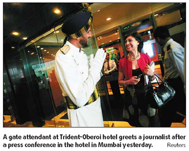 Mumbai's targeted hotels reopen partly