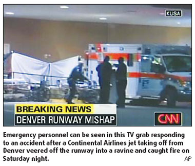 Passengers escape burning jet, 38 hurt