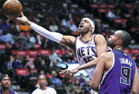 Carter, Yi shine as Nets down Kings