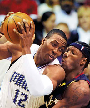 Howard leads Magic to 99-88 win over Cavaliers