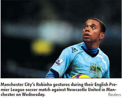 Man City back Robinho over sex assault probe