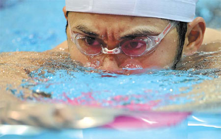 Kitajima pours cold water on 'triple-double' bid