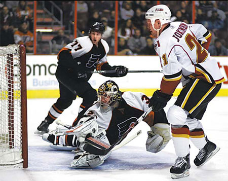 Flames new additions help sink Flyers