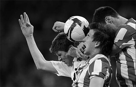 Barca back on track as Real held
