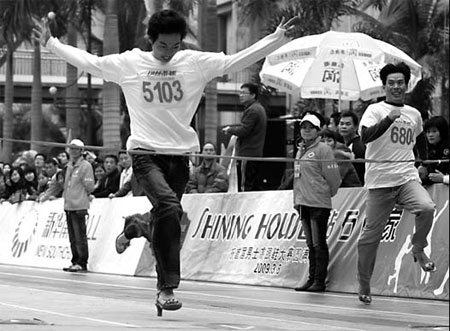 Man in high heels wins running contest