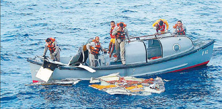 17 bodies recovered, crash cause remains mystery
