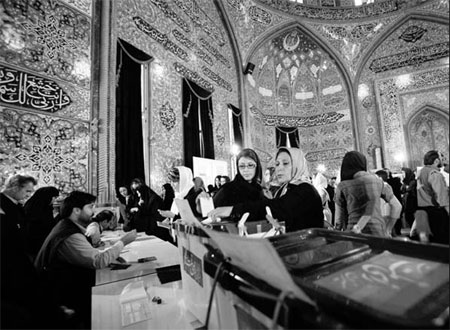Iranians throng to vote