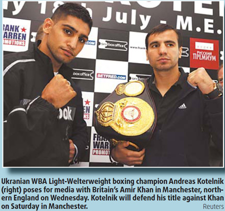 Khan eyes first world title bout
