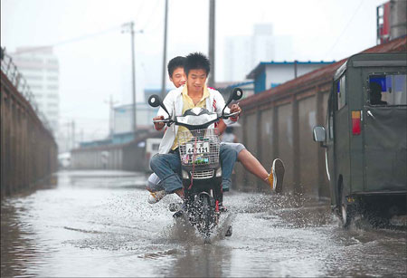 Torrential rain kills eight; five missing