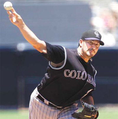 Rockies' Marquis becomes 1st 12-game winner