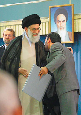 Ahmadinejad seals it with a kiss