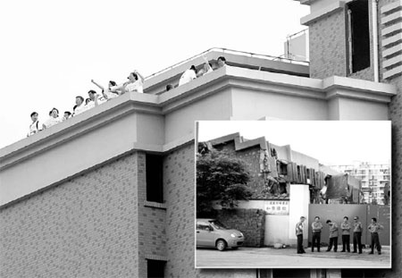 Toppled residential building demolished