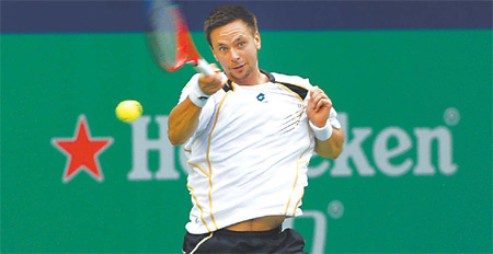 Djokovic powers on, more retirements in Shanghai