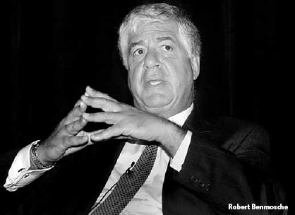 AIG chief threatens to quit