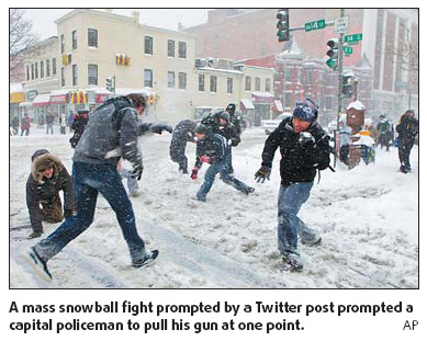 US police officer put on desk duty after pulling gun at snowball fight