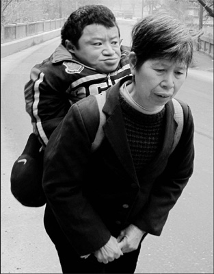 On the shoulders of a mother's love