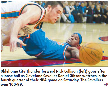 Gibson's 3, James' D give Cavs win