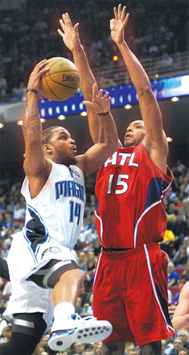 Magic handle Hawks, 104-86