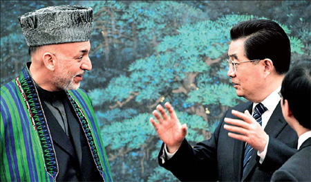 Karzai visit yields major pacts
