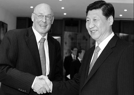 No change in currency policy, Xi tells Paulson