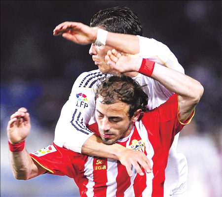 Title race alive for wounded Real